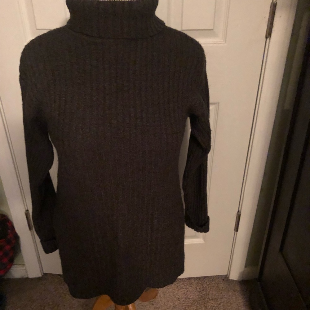 Dark gray long turtleneck sweater.